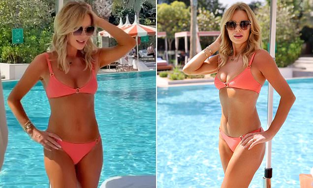 AMANDA HOLDEN BURNS THE EYES IN A FIERY BIKINI AMIDST THE SCANDAL OF 'FIXED' RESULTS AT BRITAIN'S GOT TALENT!
