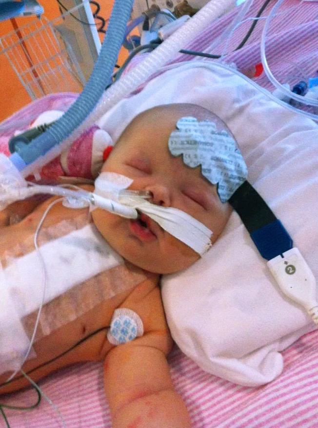 "Felicity’s First Christmas Miracle: From Heart Surgery to Celebrating Health with Santa’s Light-Up Shoes" 6039