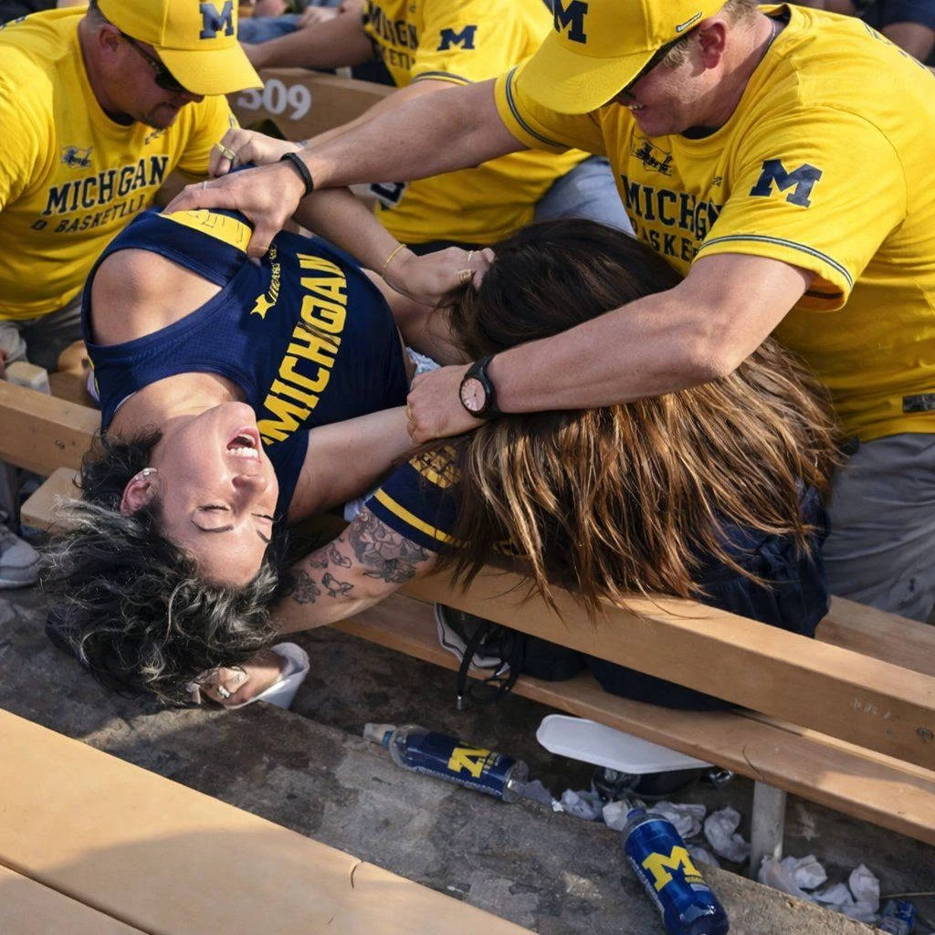 Two Female Michigan Wolverines Basketball Fans Throw Wild Haymakers in One of the Craziest Fights You’ll See [VIDEO]